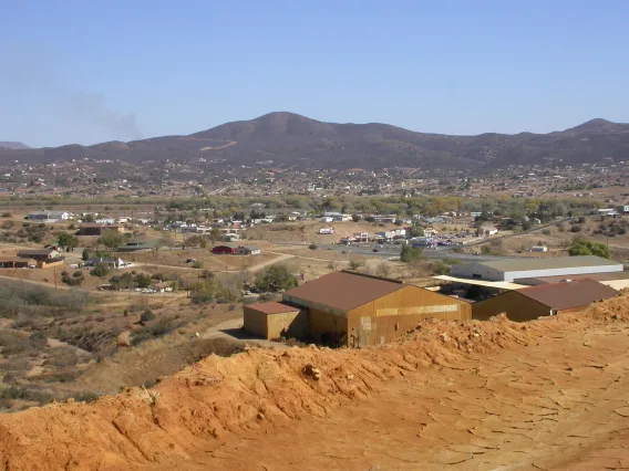 An overlook of a southwest city near a national Superfund site