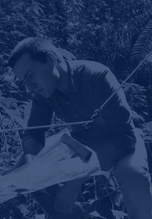 Person looking at plants with blue overlay